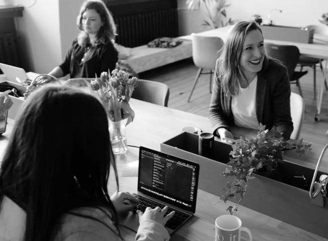 people smiling on work environment